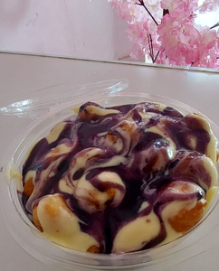 mini eclairs with custard and blueberries