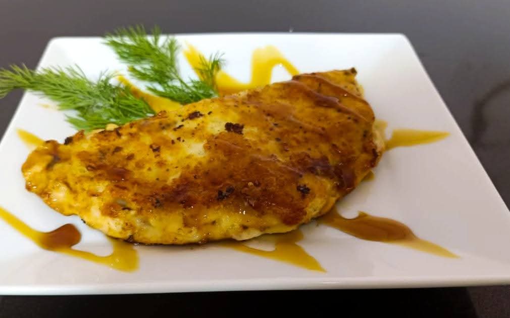 Meat schnitzel with mozzarella and tomato
